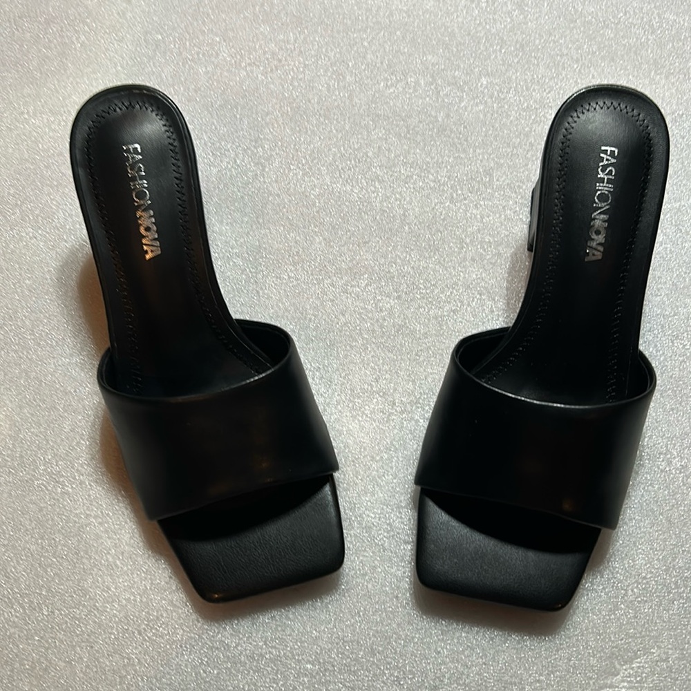 Black leather block heels, square toe. Size 5.5 NIB